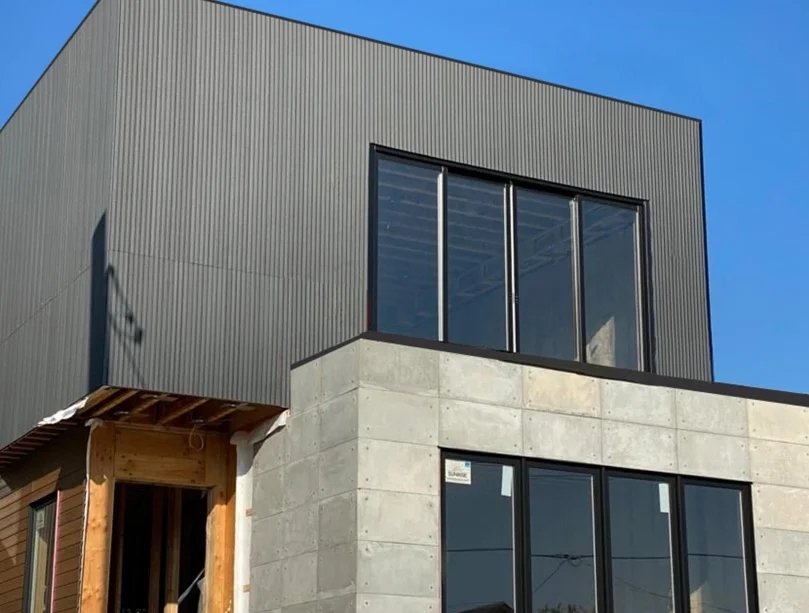 Ashwood and Dark Grey Shiplap Cladding define industrial sophistication