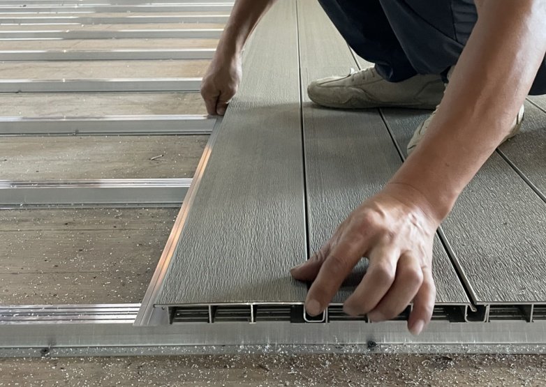 Hidden clips secure LuxeFlow Decking with perfect alignment and spacing