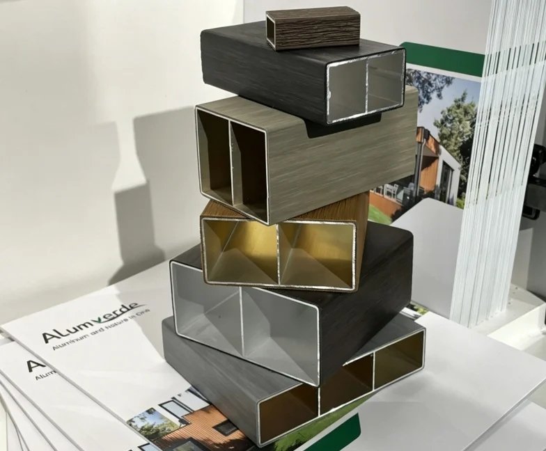 Co-extrusion aluminum tube profiles for detailed and grand architectural applications